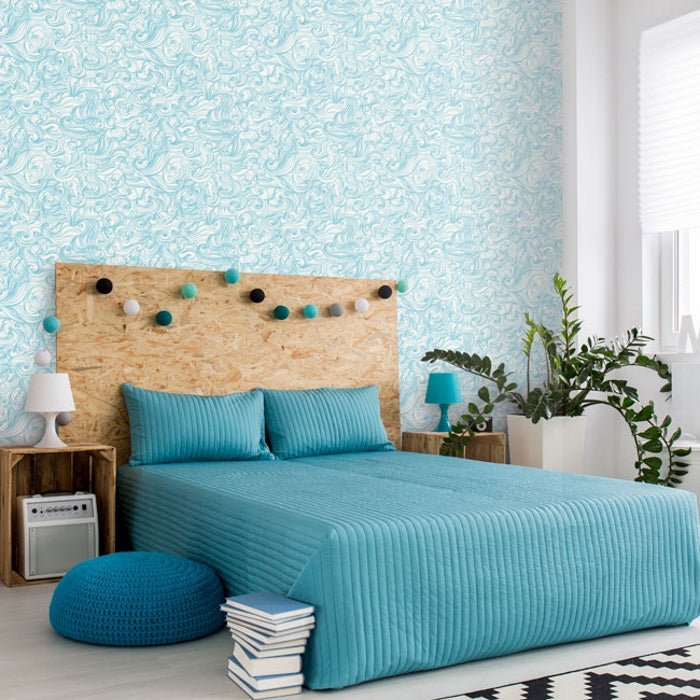 turquoise themed grown-up bedroom with blue japanese wallpaper