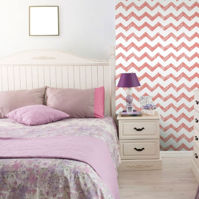 Scandinavian style bedroom with white and red geometric wallpaper