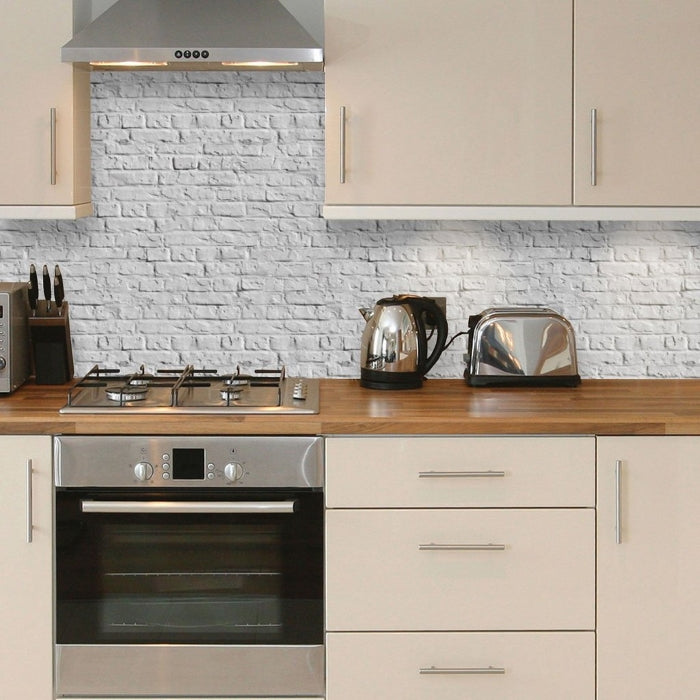grey and pink decorated kitchen with brick texture wallpaper