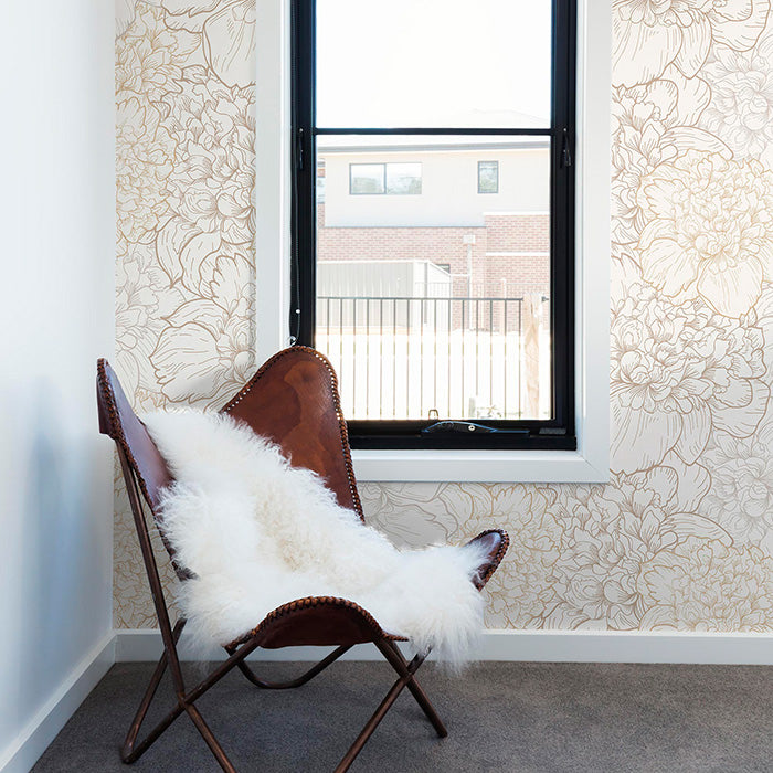 window area with two-toned beige colored flowers with metallic accents wallpaper