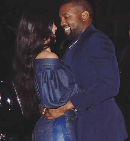 Kim Kardashian and Kanye West hugging  