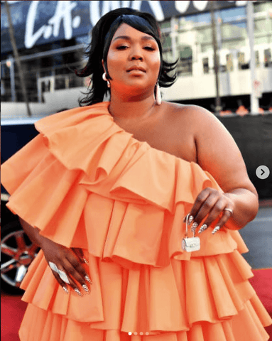 Lizzo wearing Valentin-HO custom look for American Music Awards