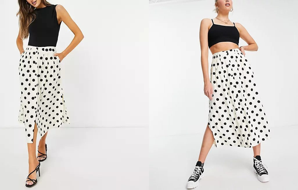 model pictured wearing the ASOS Design Button-Through Midi Skirt in Polka Dot.