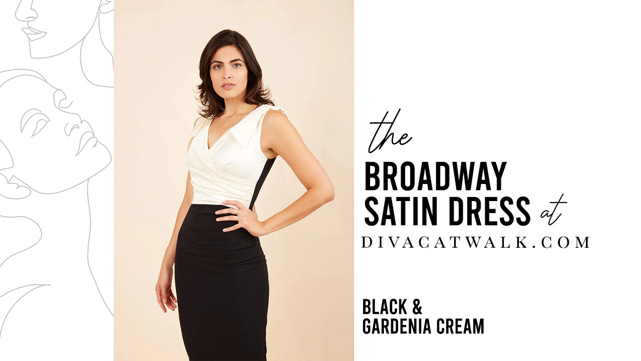 A model pictured wearing the Broadway Satin dress in black and gardenia cream from DivaCatwalk.