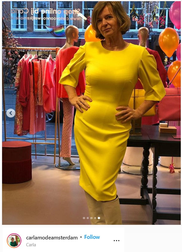 One of DivaCatwalks customers wearing the yellow Chiswick Pencil Dress.
