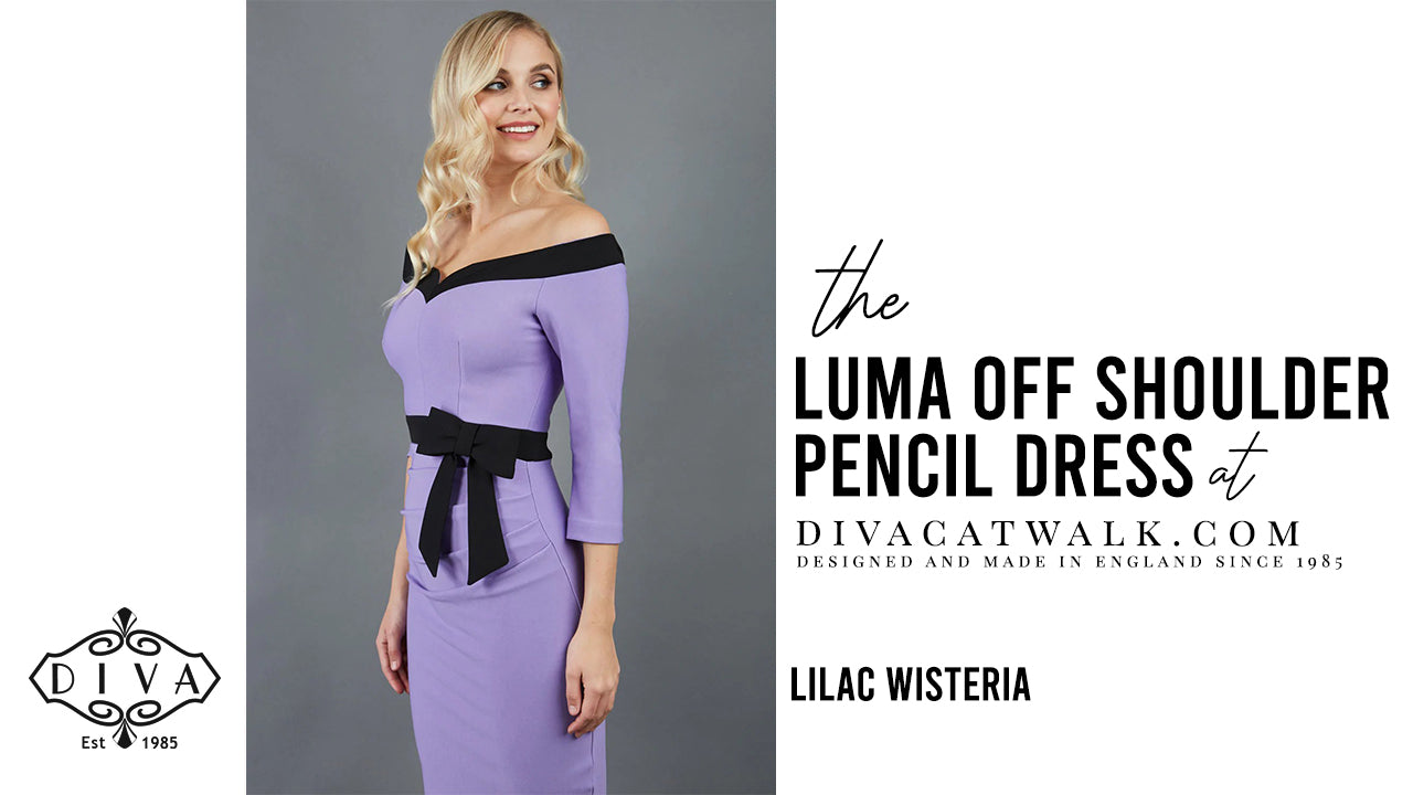  a woman model pictured wearing the Luma Off Shoulder Dress in Lilac Wisteria with text showing the dress title.