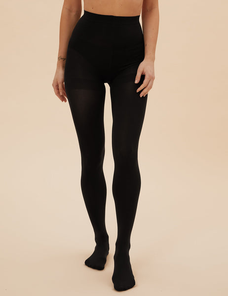 a models legs shown wearing the Marks and Spencer 60 Denier Body Sensor tights.