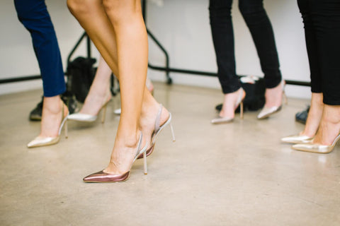 women dancing in high heeled shoes