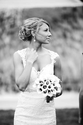 bride in queen anne neckline dress black and white photo 
