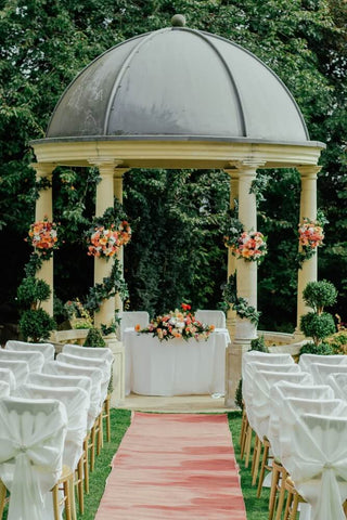 wedding set up for the ceremony with chairs walkway and altar 