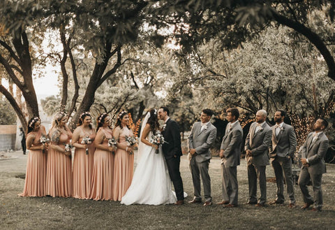 wedding photo, bridesmaids in peach dresses, bride, groom, groomsmen 