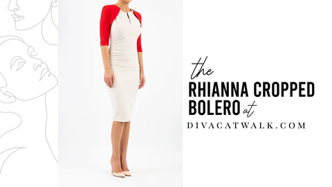 woman pictured wear a cream dress and a bright red Rhianna Cropped Bolero.