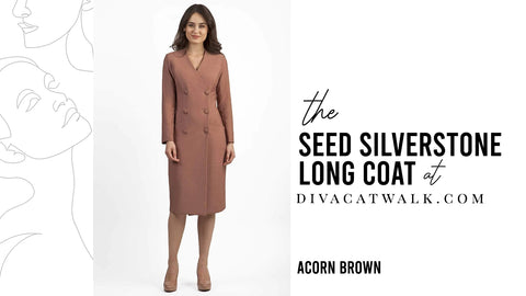 A woman modelling the Seed Silverstone coat in acorn brown from divacatwalk.com