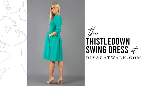   a woman model pictured wearing the Thistledown Swing Dress in Emerald Green with text showing the dress title.
