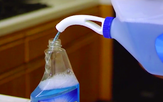 Easily pour windex using the no spill spout, a funnel made for pouring without spilling