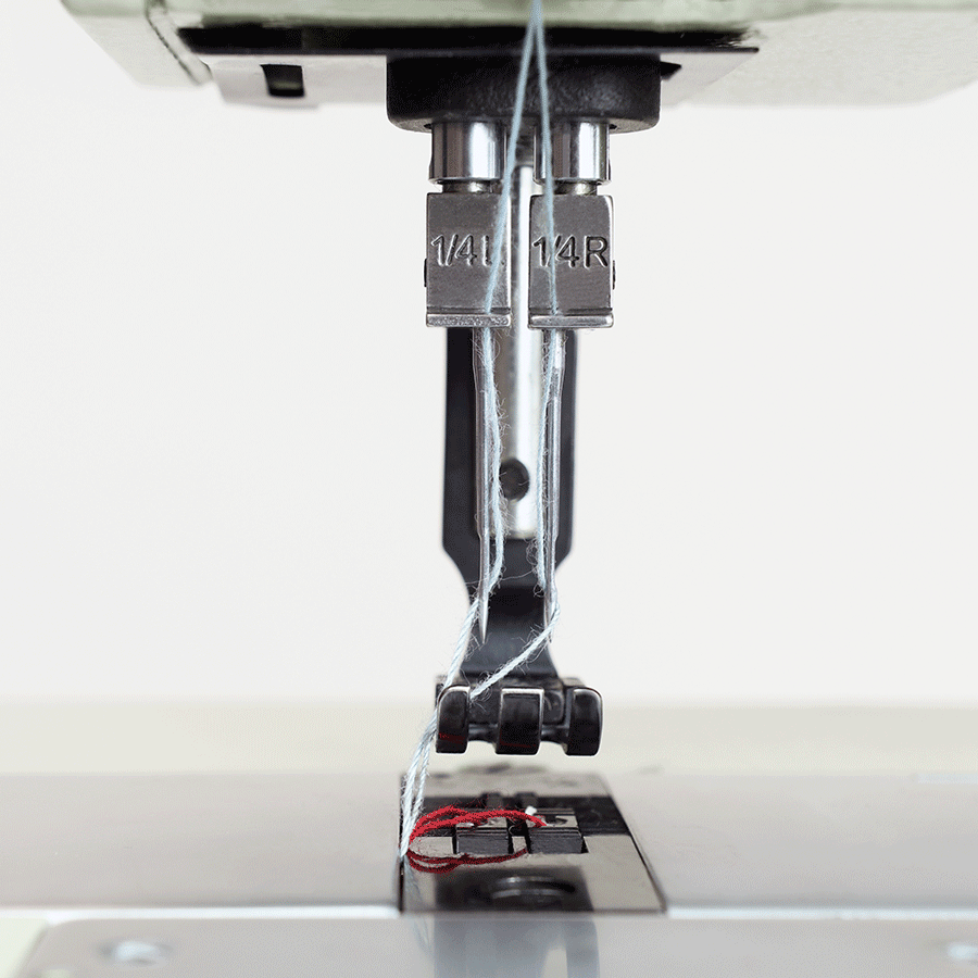 The Yamata High-Speed Four-Thread Industrial Sewing Machine has two needles that allow you to sew parallel stitches without running the fabric through the machine twice