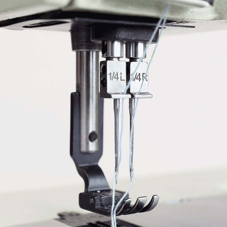 The Yamata Double-Needle Lockstitch Industrial Sewing Machine has a separate needle bar that allows you to operate the machine as a single-needle machine