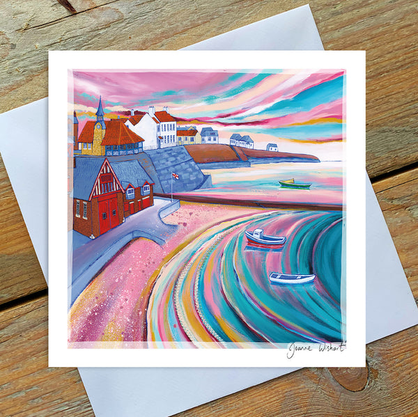 A greetings card featuring Cullercoats beach and RNLI lifeboat station. 