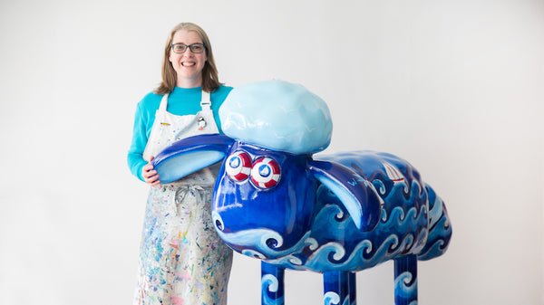 Artist Joanne wishart with her Shaun the Sheep Design