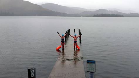 BBC weather pictures two ladies swimming in a flooded derwent
