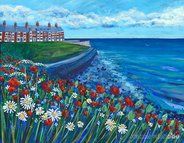 A painting of Browns bay showing a cluster of brightly colour wildflowers in the forground with a row of Victorian terraced houses overlooking the sea. 