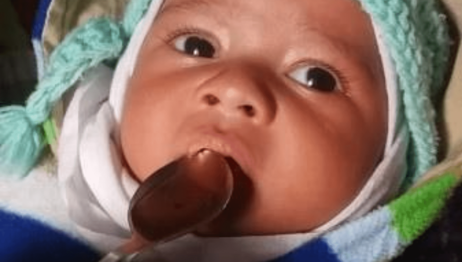 Baby being given traditional medicine in Meghalaya