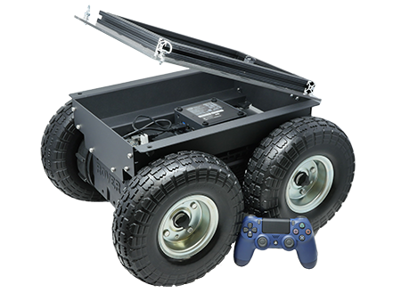Rover Robotics Rover Pro UGV with a R&D payload on top and a PS4 controller