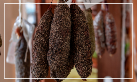 A bunch of salami hanging above the deli counter at Delilah Fine Foods Nottingham