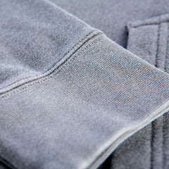Pigment Dye sleeve &amp; pocket detail in color Pigment Black.