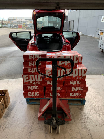 Epic beer being loaded into the back of the Kia Stinger GT