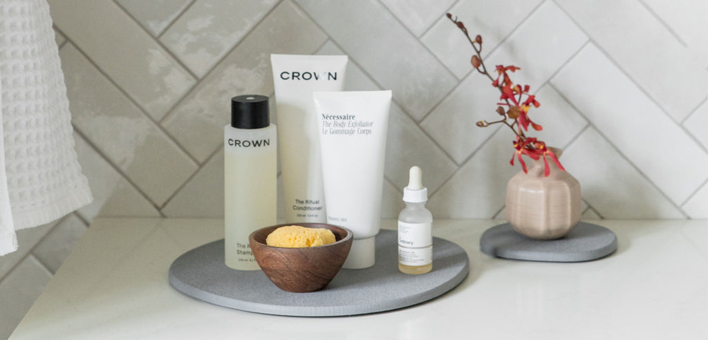 Mixed Saucer Set with Skincare Products on Bathroom Counter