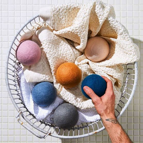 Dryer Balls in laundry basket