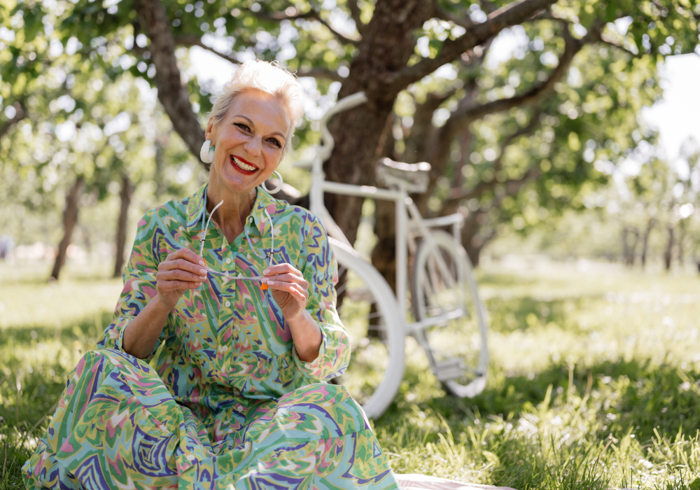 woman with silver hoops on a bike ride