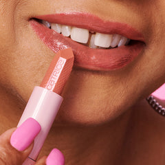 Woman Applying Glam Lip Balm