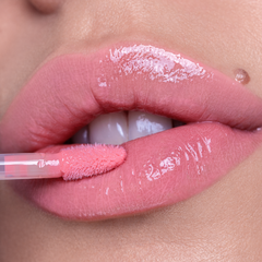 Applying Voluminizing Lip Gloss