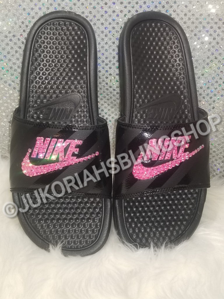 pink and black nike slides