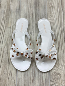 white bow flip flops