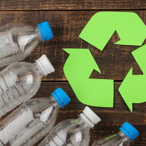 Plastic bottles and recycling symbol