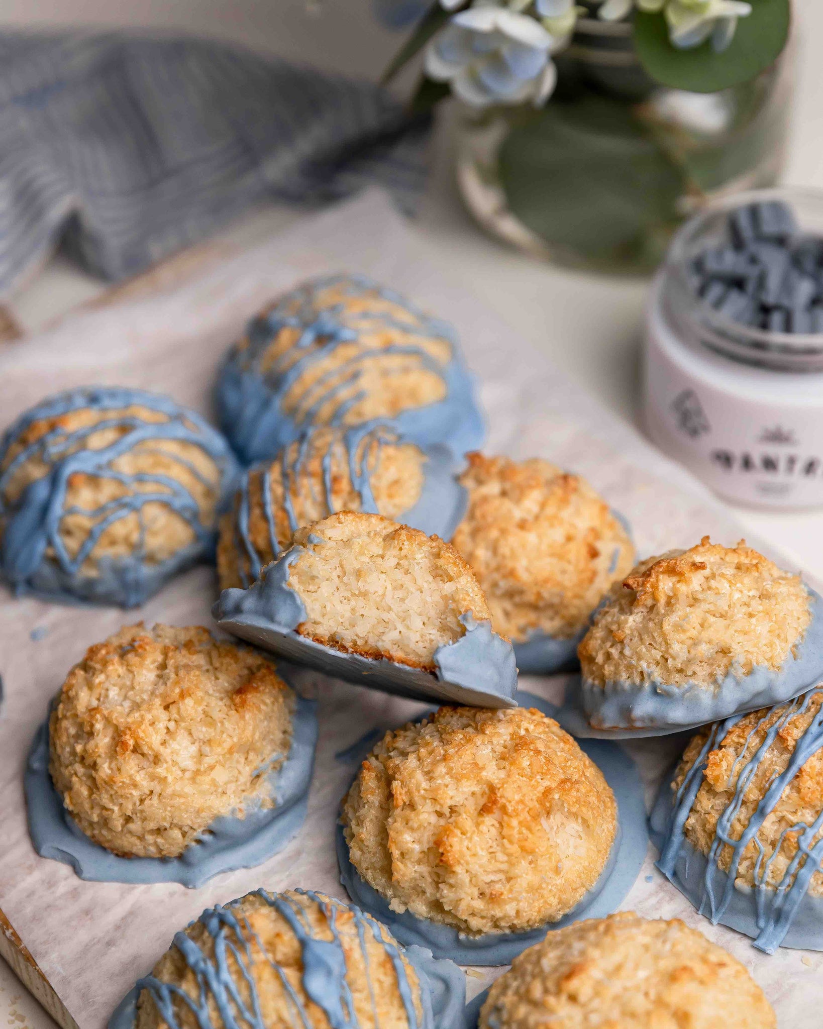 pile of finished macaroons with just one bite taken out.