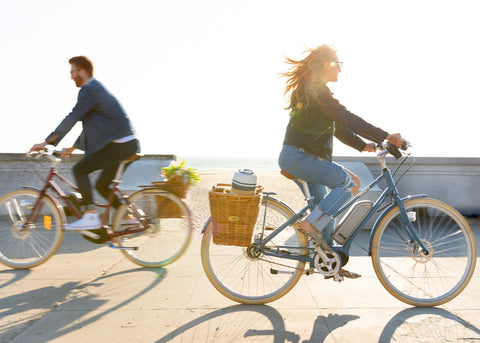 people biking outside. The Pros and Cons of Electric Bikes