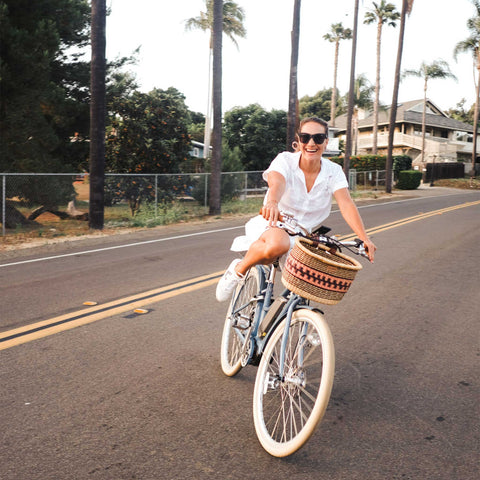 woman riding an e bike. electric bike laws by state