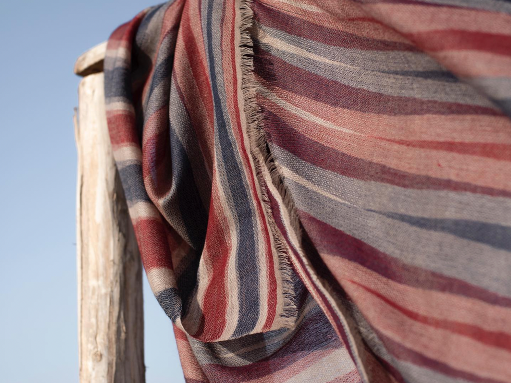 A beautiful handwoven cashmere scarf with earth tones