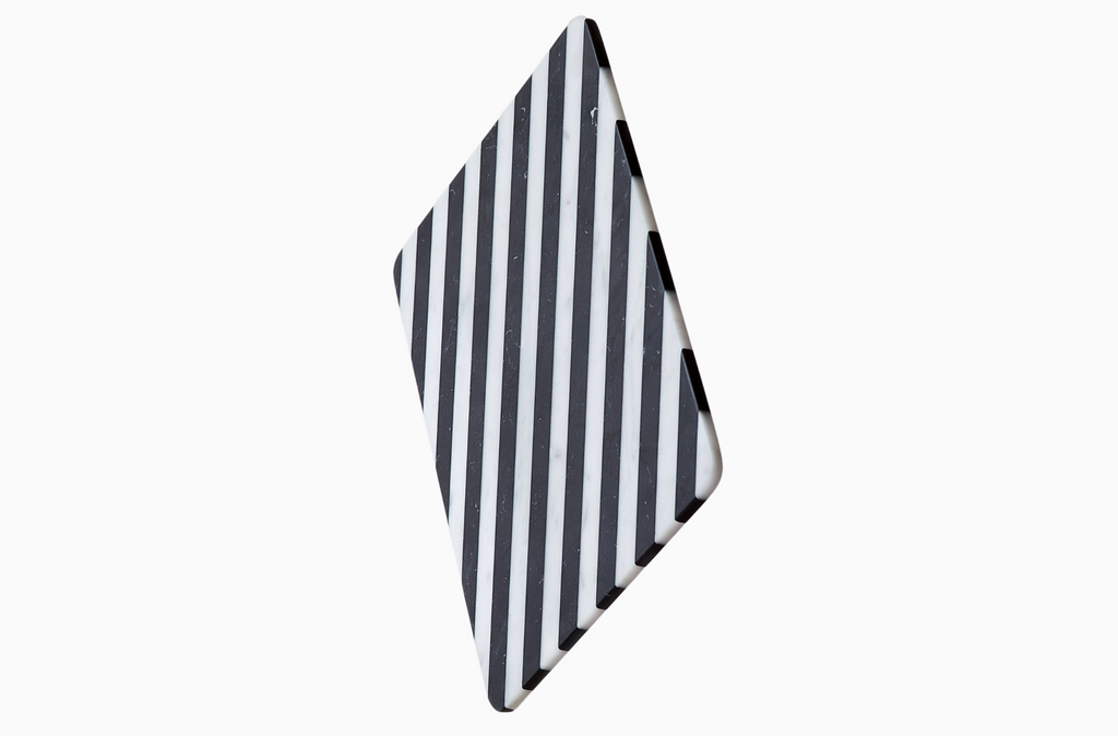 The Alice Chopping Board made from striped black and white marble.