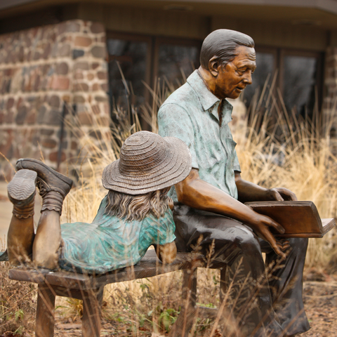 Quality Time Bronze Outdoor Sculpture