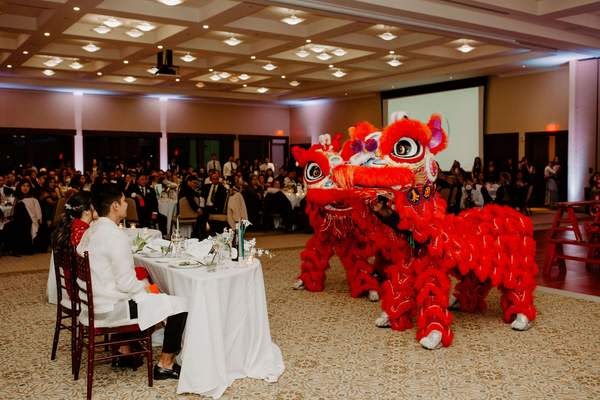 A Chinese-Filipino wedding featuring a red cheongsam and lion dancing