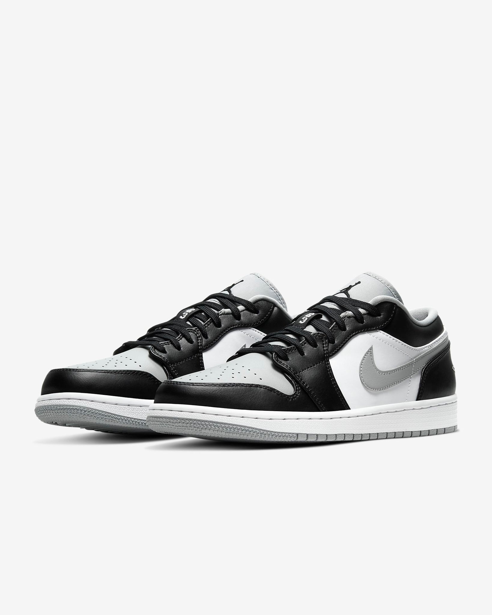 black and grey low jordan 1