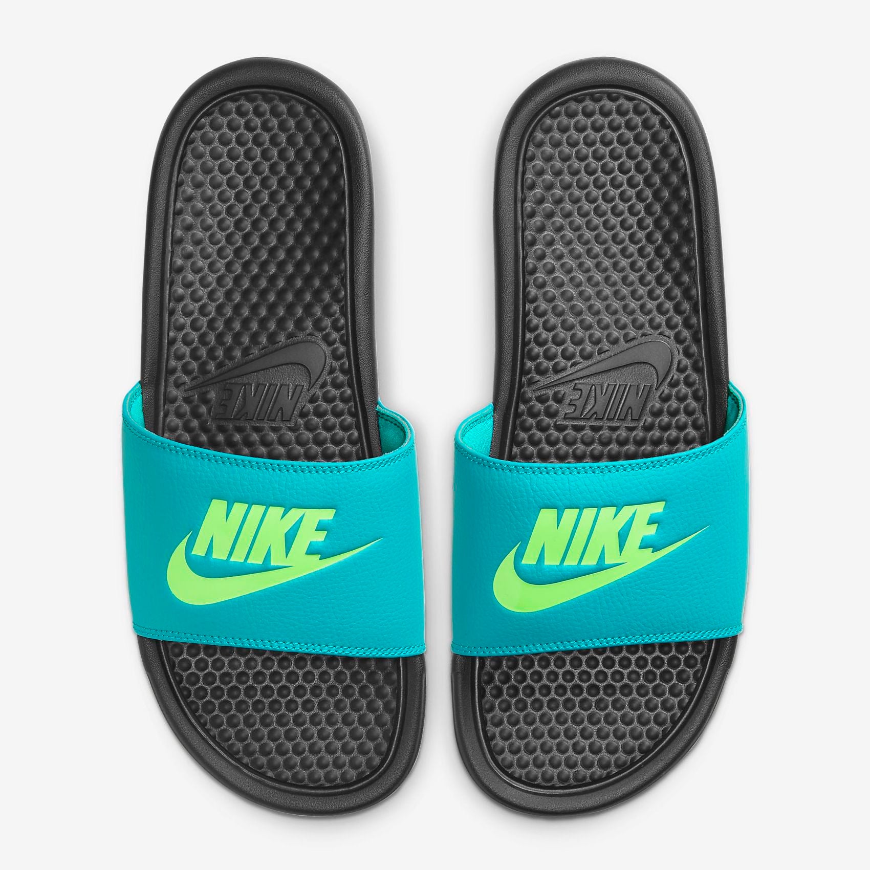 blue and green nike slides