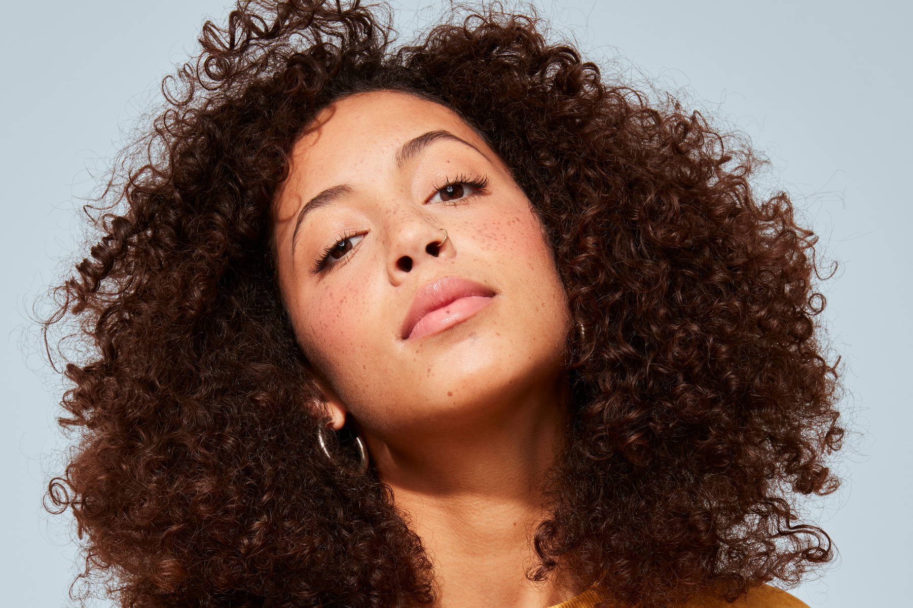 What Causes Frizzy Hair? – Odele Beauty