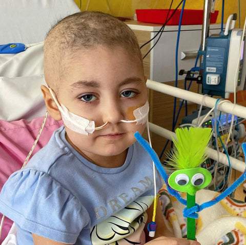 Evie little girl in hospital following bone marrow transplant, cancer treatment, leukaemia