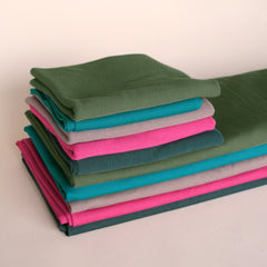Stack of our Bamboo & Cotton Stretch Fleece and 2x2 Ribbing